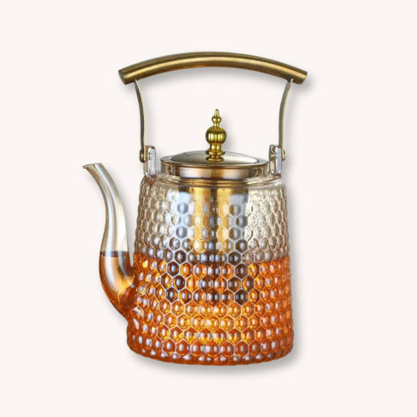 Théière en verre à manche cuivre – Elégance artisanale